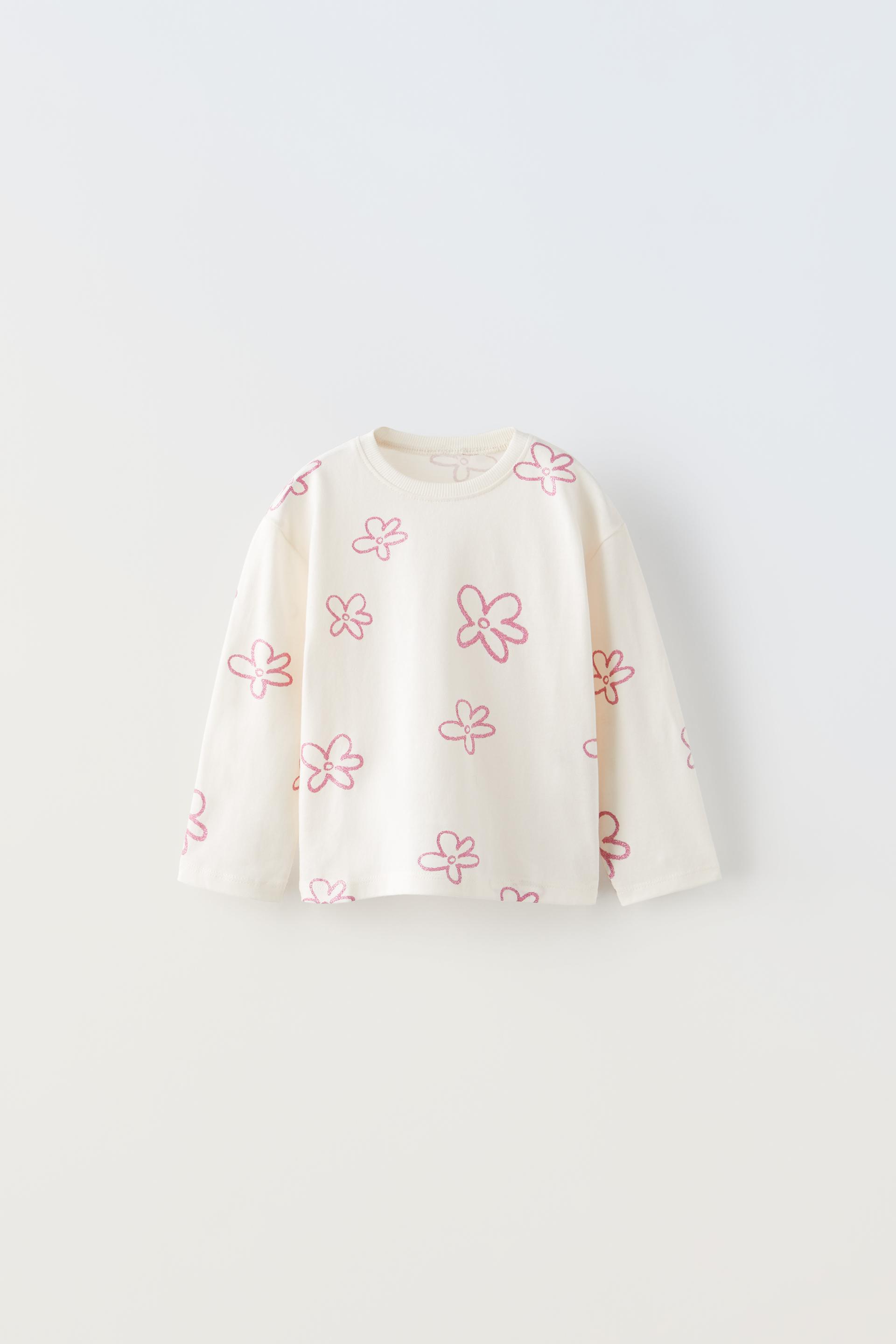 

ФУТБОЛКА С БЛЕСКНЫМ ПРИНТОМ