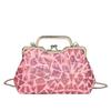 Bag new 2025 European and American fashion sequins colorful portable dinner bag ins women's retro clip shell bag
