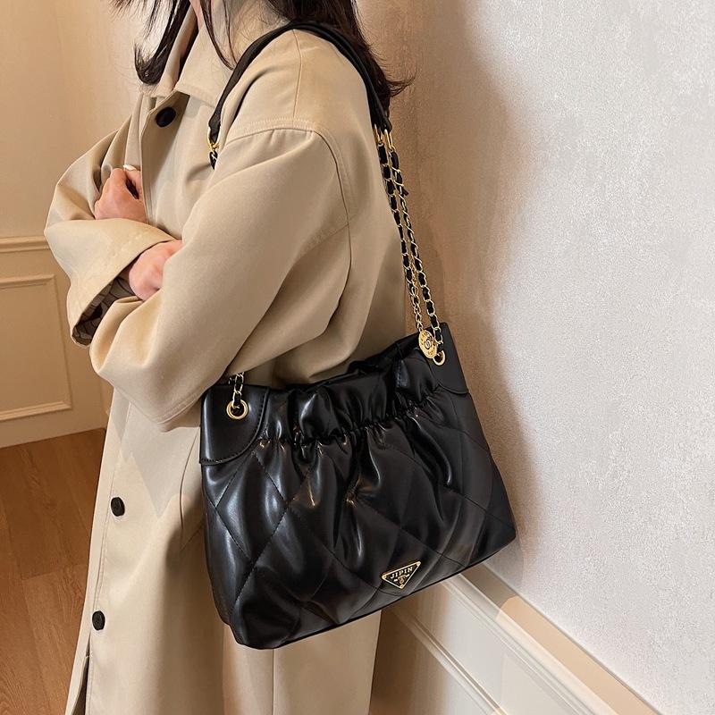 Xiaoxiangfeng Rhombus-Ketten-Bucket-Bag Damen 2025 neue trendige Mode einfarbige Tragetasche große Kapazität Achseltasche