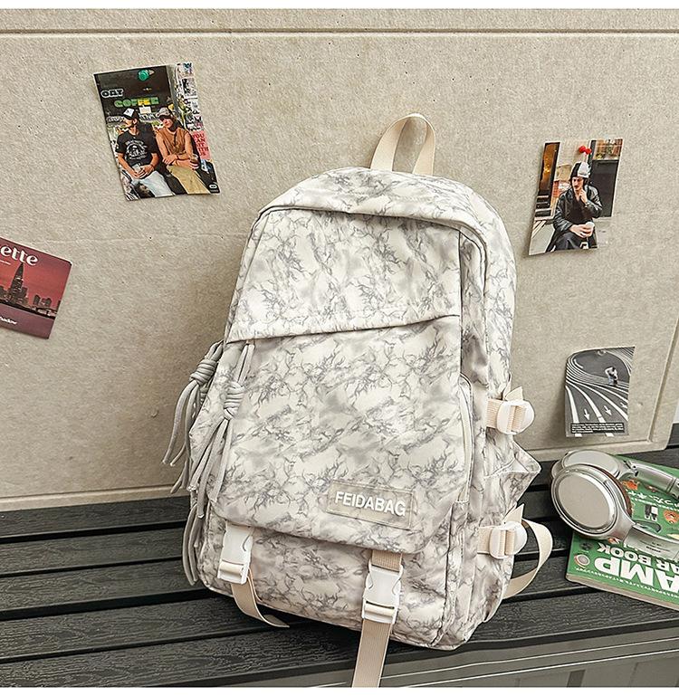 School bag 2025 new backpack light leisure simple outdoor travel backpack junior high school large capacity versatile school bag
