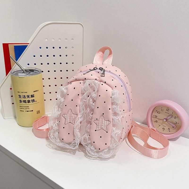 Schoolbag Korean version of sweet girl polka dot lace backpack new lop-eared rabbit trend high value travel foreign style backpack