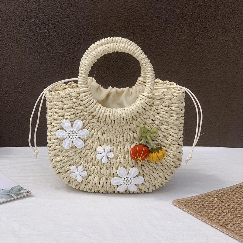 Summer woven bag women's niche design semi-round straw woven bag leisure vacation wind beach bag women's portable messenger bag