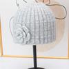 Three-dimensional flower knitted headgear women's autumn and winter face small warm windproof cold hat ear protector wool hat pullover hat