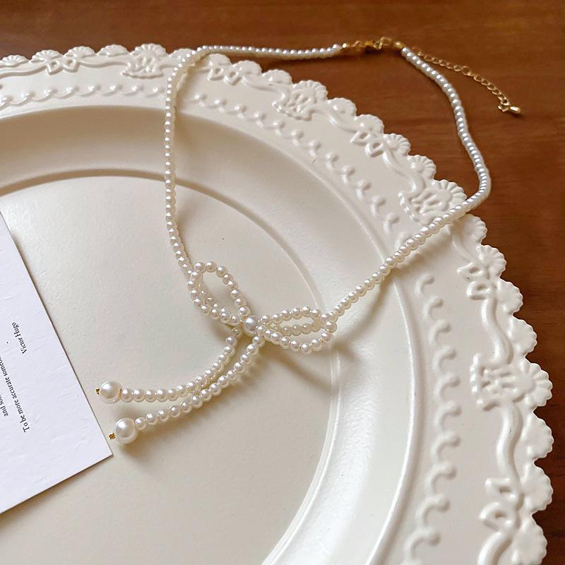 Elegante französische Light Luxury Perlen-Schicht-Schlüsselbeinkette - Vielseitiger Nischendesign-Schmuck für Frauen