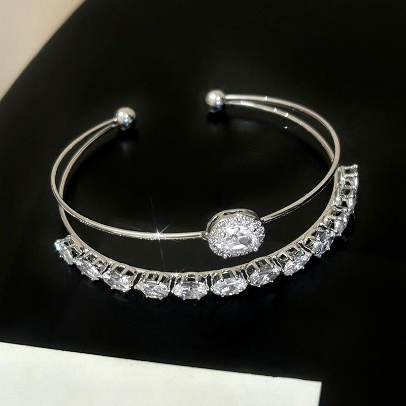 

Браслет из циркония супер-блеска, двойной, овальный, класса люкс, темпераментный, модный, высококлассный, простой, нишевый, универсальный, женский