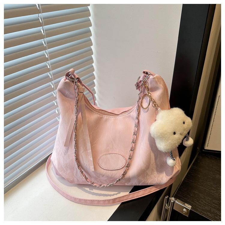 

This year s popular large-capacity tote bag 2025 summer new simple casual shoulder bag simple casual commuter bag Without pendant розовый