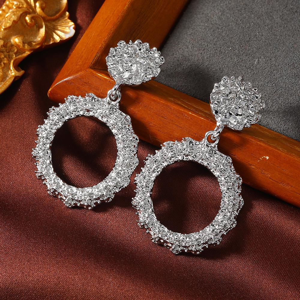 Retro Metallic Geometric Alloy Earrings: Bold, Creative Design for Women