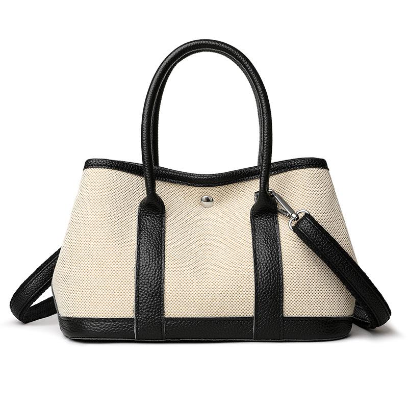 Uma Bolsa Tote Transversal Simples e Elegante com Cores Combinadas para Deslocamento