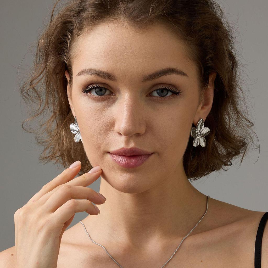 Stainless Steel Flower Stud Earrings: Elegant European & American Design for Women