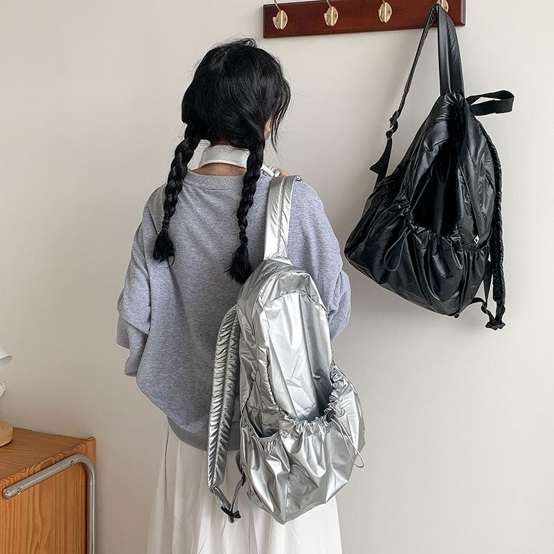 Sac à dos premium en cuir souple Argent Version coréenne Nouveau design de niche Grande capacité Tendance Sac à dos pour filles