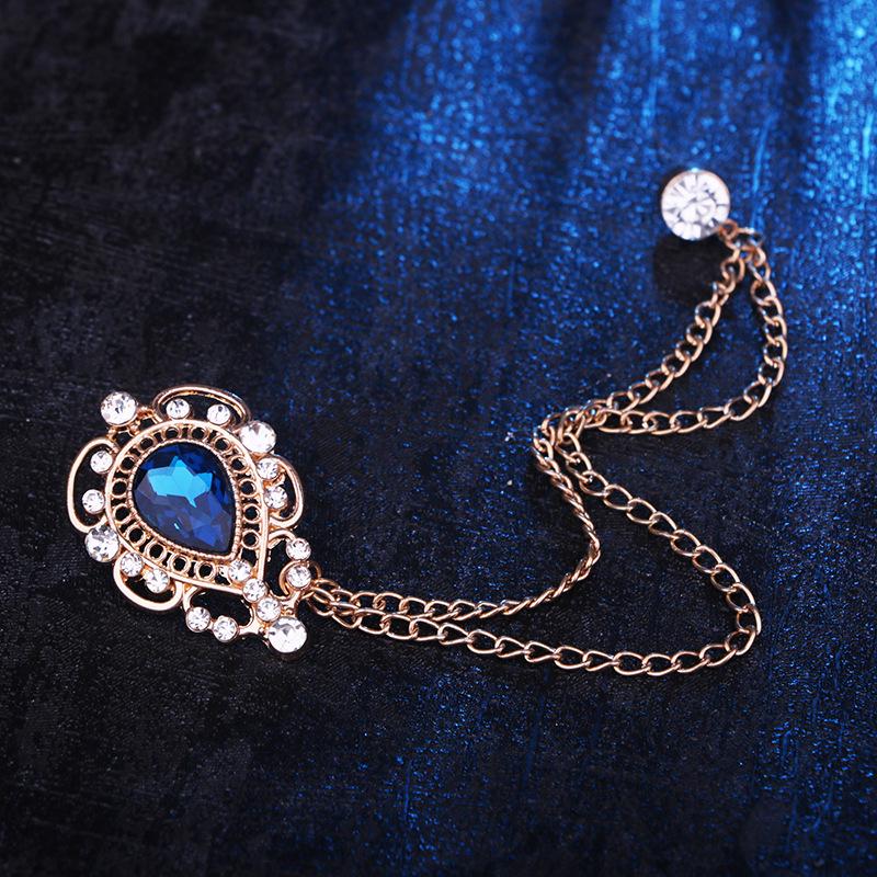 European & American Fashion Hollow Water Drop Brooch: Heart Chain Tassel Corsage for Men's and Women's Coats - Stylish, High-End Accessory.