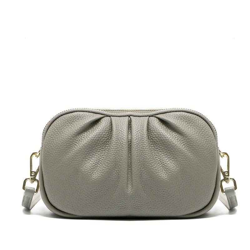 Leder-Damenhandtasche, High-End-Handytasche, neue erste Schicht Rindsleder Münztasche, dreilagige Reißverschluss-Falten-Umhängetasche.