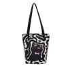Autumn and winter cute cartoon kitten canvas bag 2025 casual shoulder bag fashion portable large capacity handbag bag