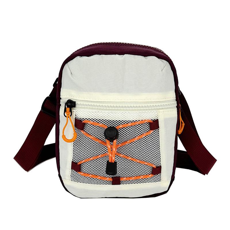 Small square bag new men's and women's street drawstrings out of the street contrasting colors fashionable small backpack