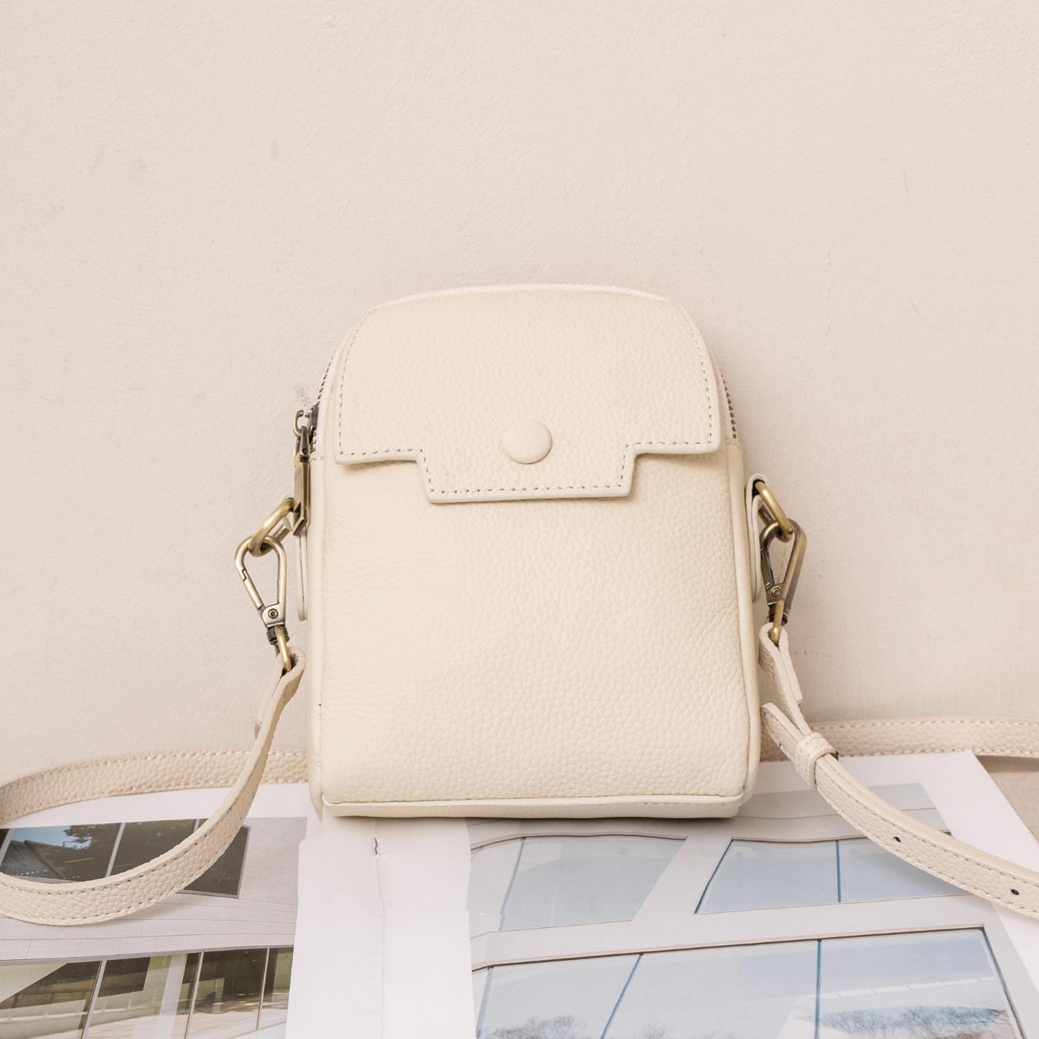 

Сумка из воловьей кожи Niche Light Luxury женская сумка Hand Grab Handbag Простая женская сумка для мобильного телефона грязно-белый