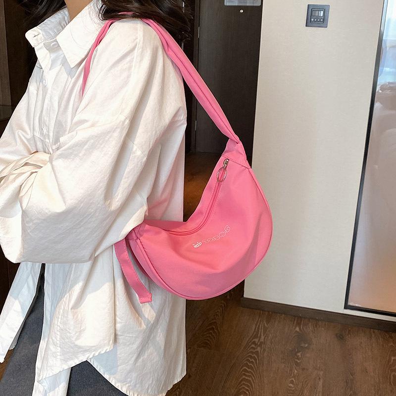 Casual versatile dumpling bag new fashion simple candy color shoulder bag large capacity student class messenger bag woman