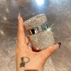 Rhinestone-Embellished Travel-Size Face & Eye Cream Bottles - High Aesthetic Design