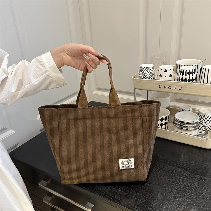 

Весна новая полосатая модная большая вместимость студенческий класс сумка-тоут женская универсальная персонализированная сумка через плечо для поездок на работу коричневый