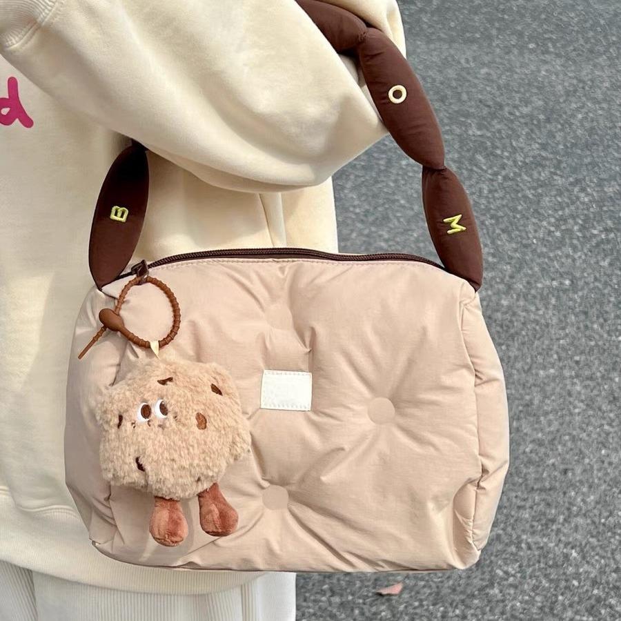 

Cotton-filled handbag women s high-end sense of work commuter women s handbag autumn and winter down bag versatile small cloth bag