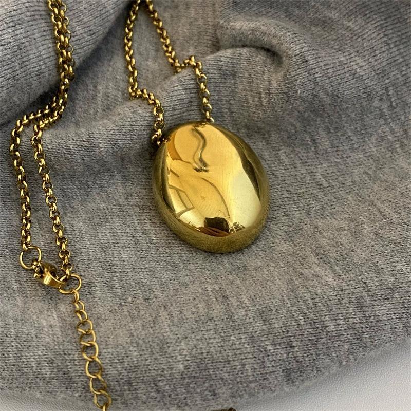 Collana Pendente Acciaio Inossidabile Forma Uovo per Donne Uomini Metallo Grande Ovale Goccia d'Acqua Catena Maglione Collana Lunga Gioielli Eleganti