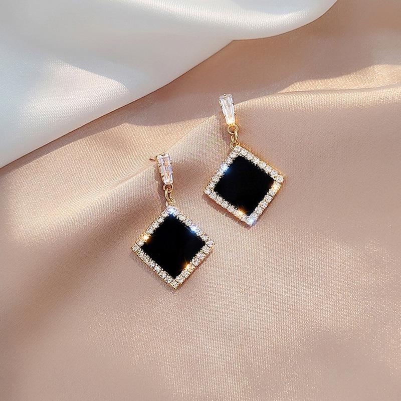 Elegant Gold-Plated Black Zircon Stud Earrings - Niche Design for a Luxurious Fashion Statement
