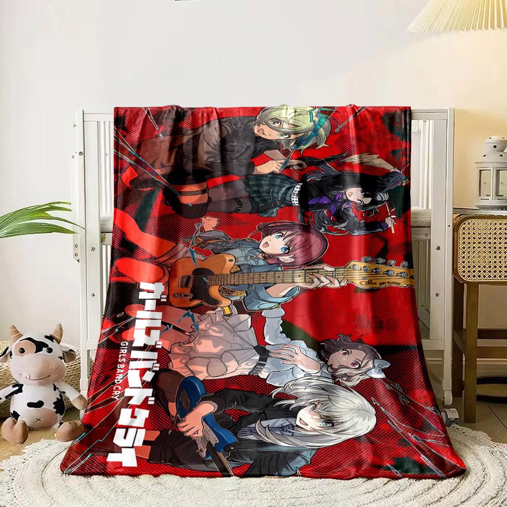 

A dynamic anime-style band with instruments against a red graphic background. for all seasons blanket lunch break throw gift 80cm x 120cm