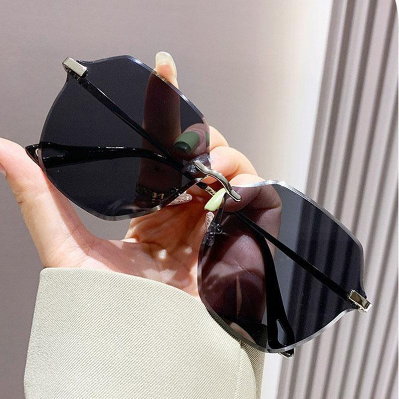 Non-polarized Oversized Frameless Cut Edge Sunglasses Female Fashionable Driving Sun Glasses