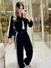 2025 Jesień/Zima Damski Zestaw Odzieży Sportowej z Długim Rękawem Zapinany na Zamek i Spodnie z Elastycznym Pasem