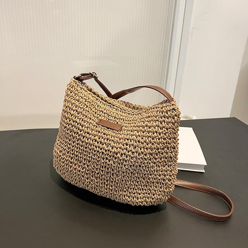 Nischen-Webstrohtasche Damen Frühling und Sommer 2025 neu vielseitige Schulter-Umhängetasche Strandurlaub Strandtasche
