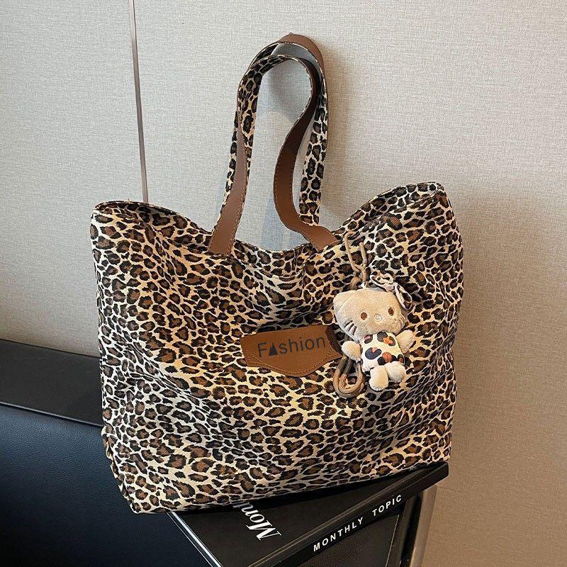 

Leopard print canvas bag women s summer autumn new fashion college tote casual large capacity shoulder travel lazy