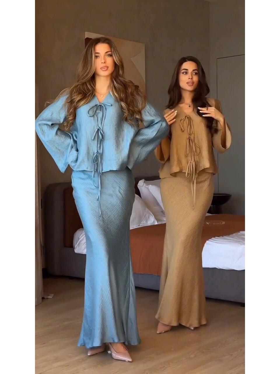 

Жіноча мода ранньої осені 2025: Комплект: топ на шнурівці та приталена міді-спідниця XXL