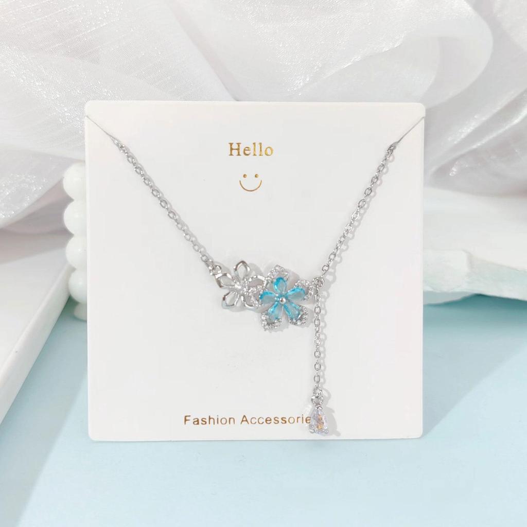 Pink Zircon Gourd Pendant Necklace with Floral Tassels - Titanium Steel Clavicle Chain for Women's Light Luxury.