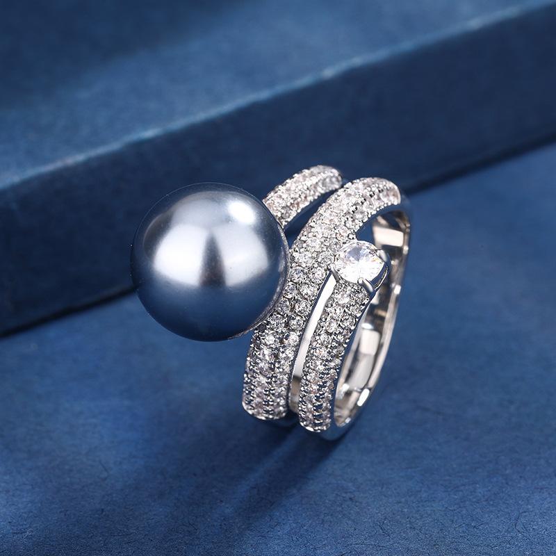 

Ювелирные изделия Медь Позолоченная Имитация Жемчуга Темперамент Личность Женское Кольцо Кольцо 12 мм