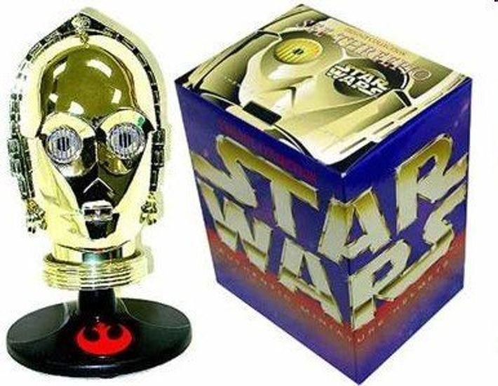

Коллекция аутентичных миниатюрных шлемов C3PO из трилогии «Звездные войны»