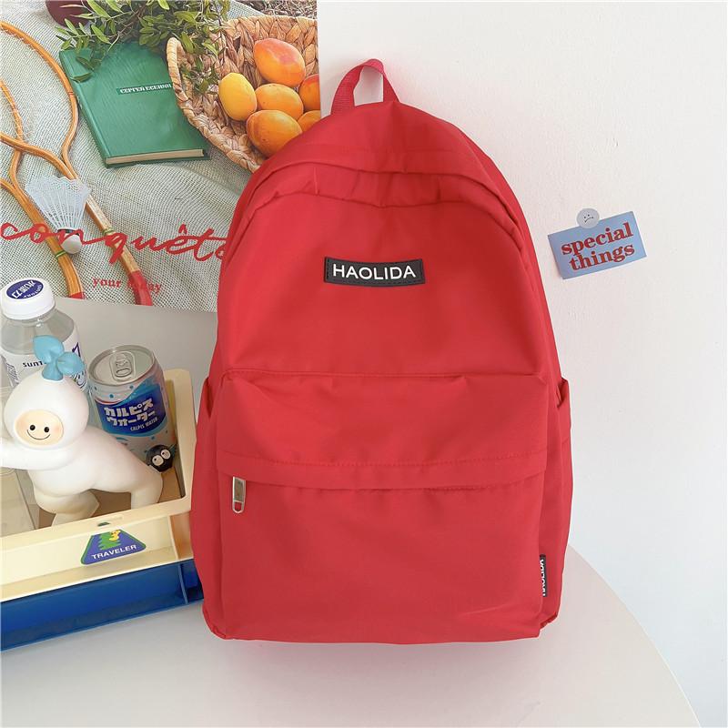 

School bag ins niche female junior high school college student minimalist backpack new large capacity lightweight backpack single bag [without pendant] красный