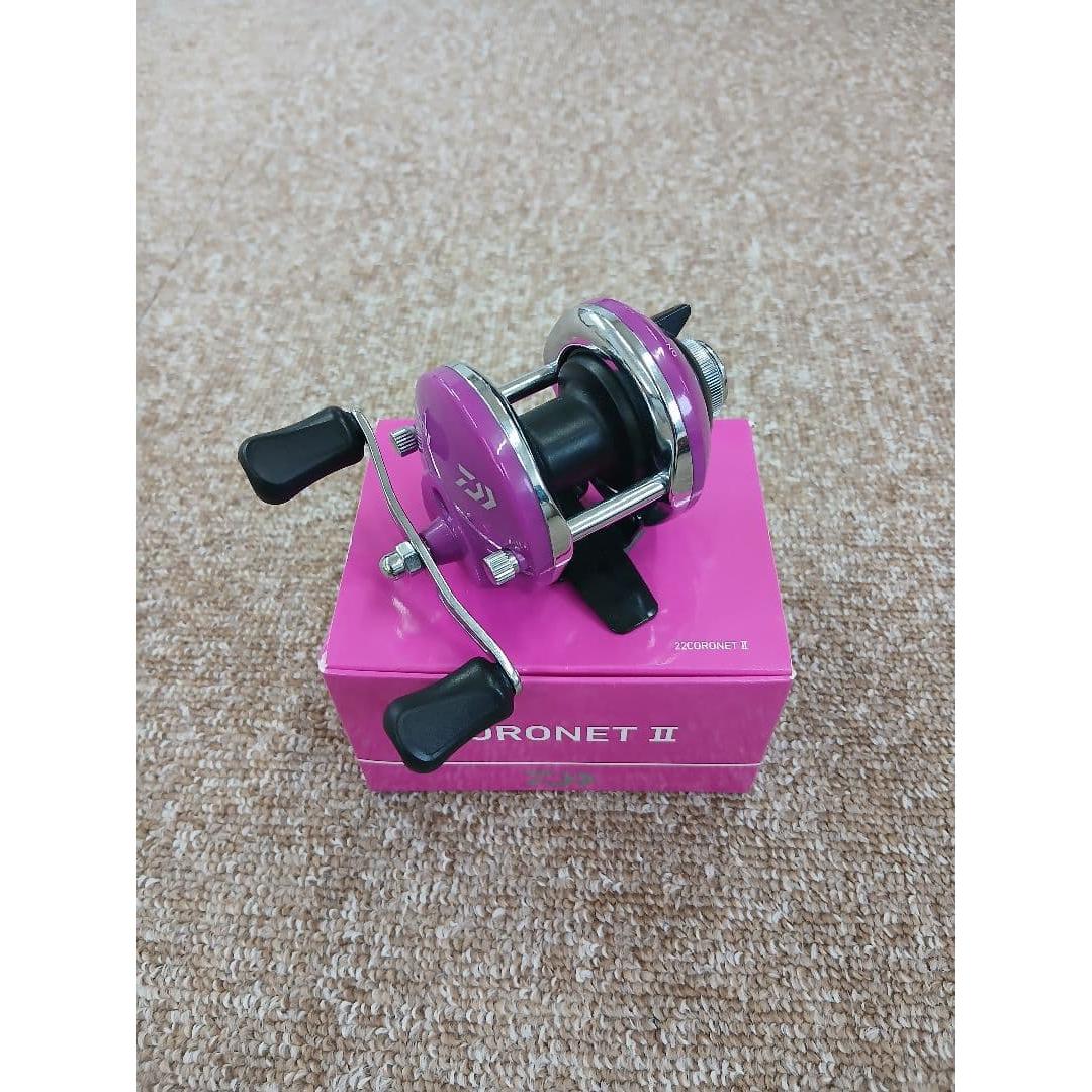 Used Daiwa CORONET II bait reel purple