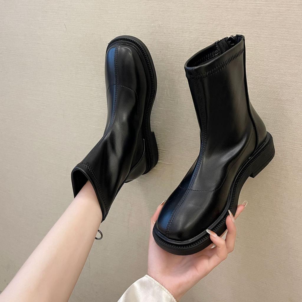Martin boots spring and autumn new flat bottom round head thin boots with skirt short boots women