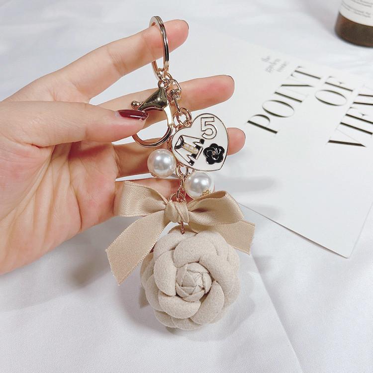 Kreativer DIY Perlenketten Camellia Schlüsselanhänger doppelseitig Modischer Auto Schlüsselanhänger Anhänger für Frauen