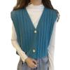 Knitted Vest, Short Top, Sleeveless Sweater Worn On Top A Small Woman with A Cardigan and A Camisole Shoulder