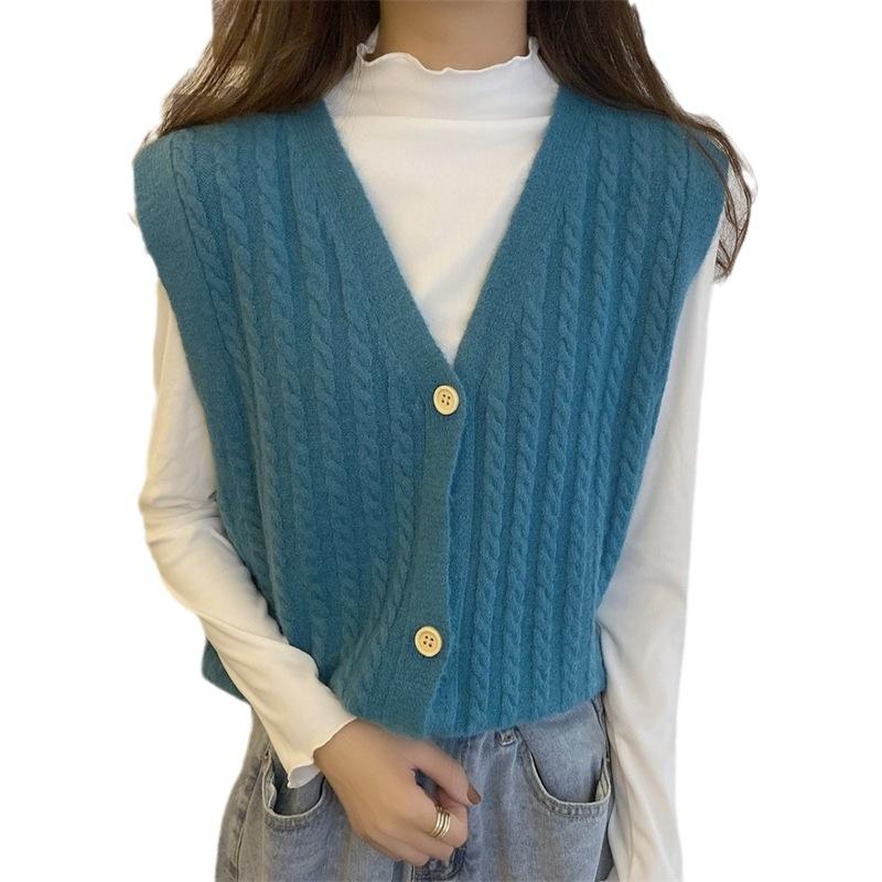 Knitted Vest, Short Top, Sleeveless Sweater Worn On Top A Small Woman with A Cardigan and A Camisole Shoulder