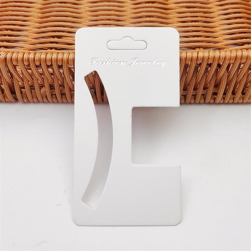 

Средняя белая карточка-клип для волос - этикетка для упаковки головного убора для взрослых Claw Clip Card Small - 5.5x10.2cm; 1 Piece