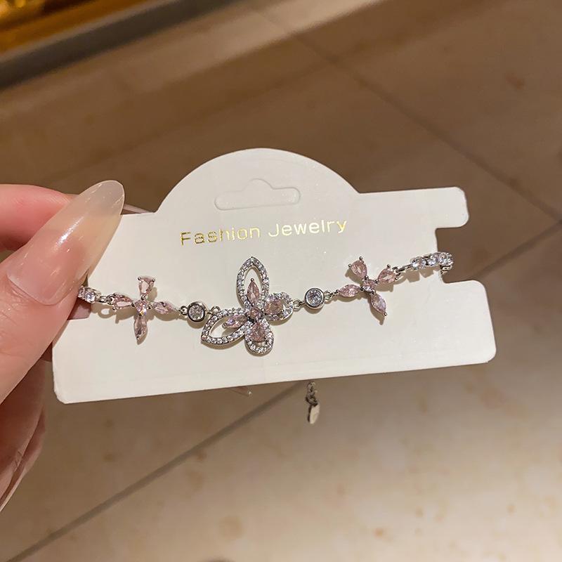 

Браслет в корейском стиле с блестящим цирконием и цветком-бабочкой - элегантные ювелирные изделия