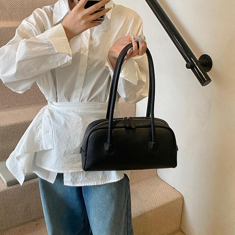 Fashion baguette bag 2025 new simple texture hand-held underarm bag high-end niche commuter shoulder bag women's bag