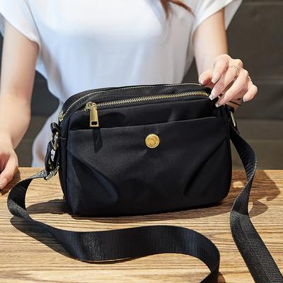 Nouveau Été Simple et Facile à Assortir Version Coréenne Sac Petit en Tissu Oxford Grande Capacité pour Femmes Sacs de Commuting Sac de Maman Tendance