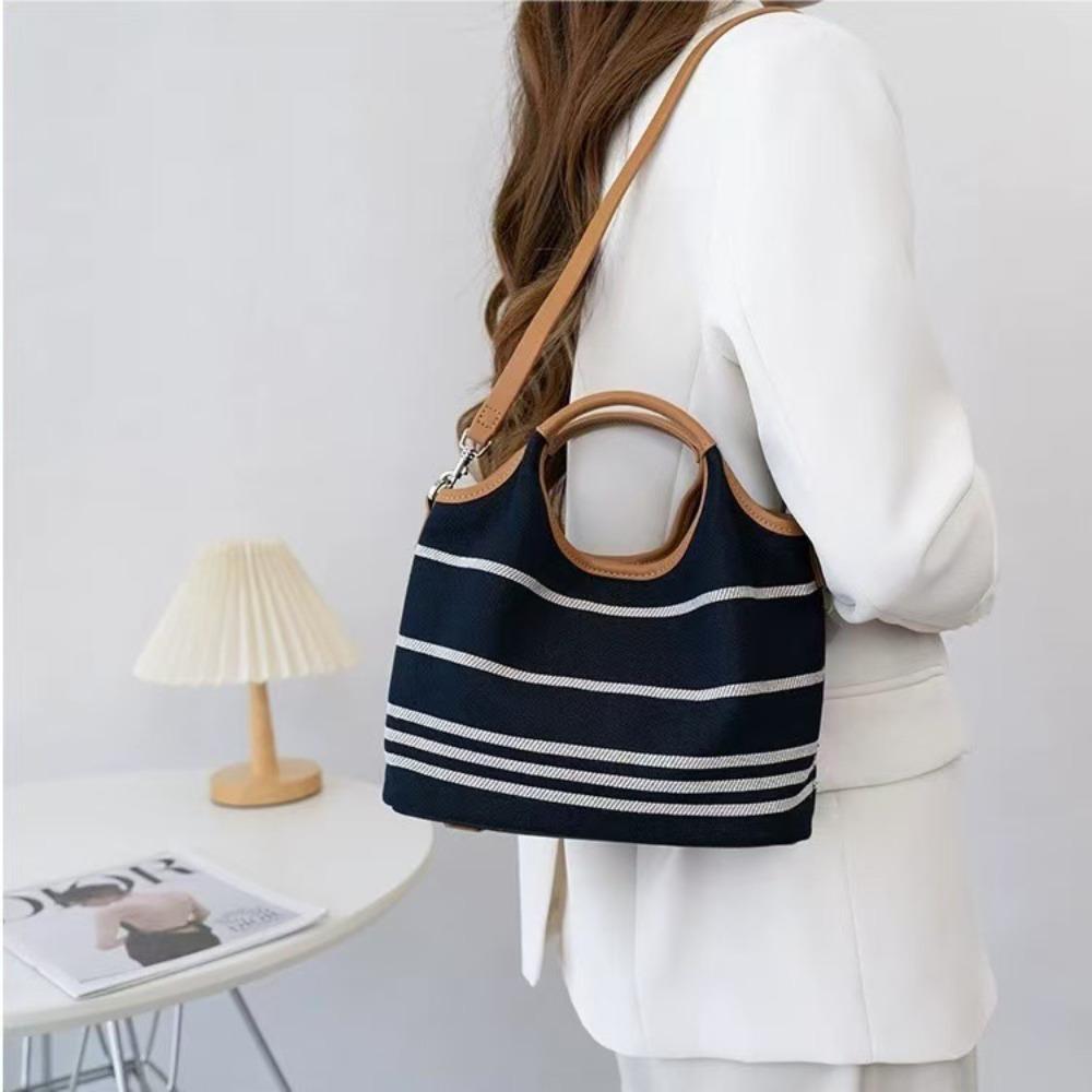 Korean niche design canvas bucket bag 2024 new contrasting color large-capacity casual tote bag commuter messenger bag