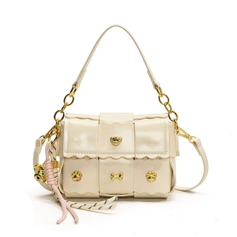 

This year s popular bags 2025 spring new Korean version fashion splicing small square bag personalized rivets niche messenger bag білий