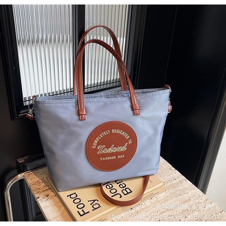 Stylish large-capacity messenger bag ins wind lightweight Oxford Buttot bag 2025 new casual commuter shoulder bag