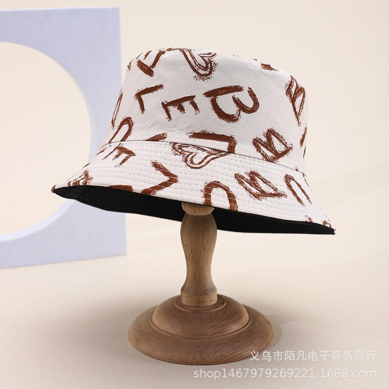 Doodle letter double-sided bucket hat, European and American fashionable casual sunshade hat, men's and women's spring/summer outing pot hat