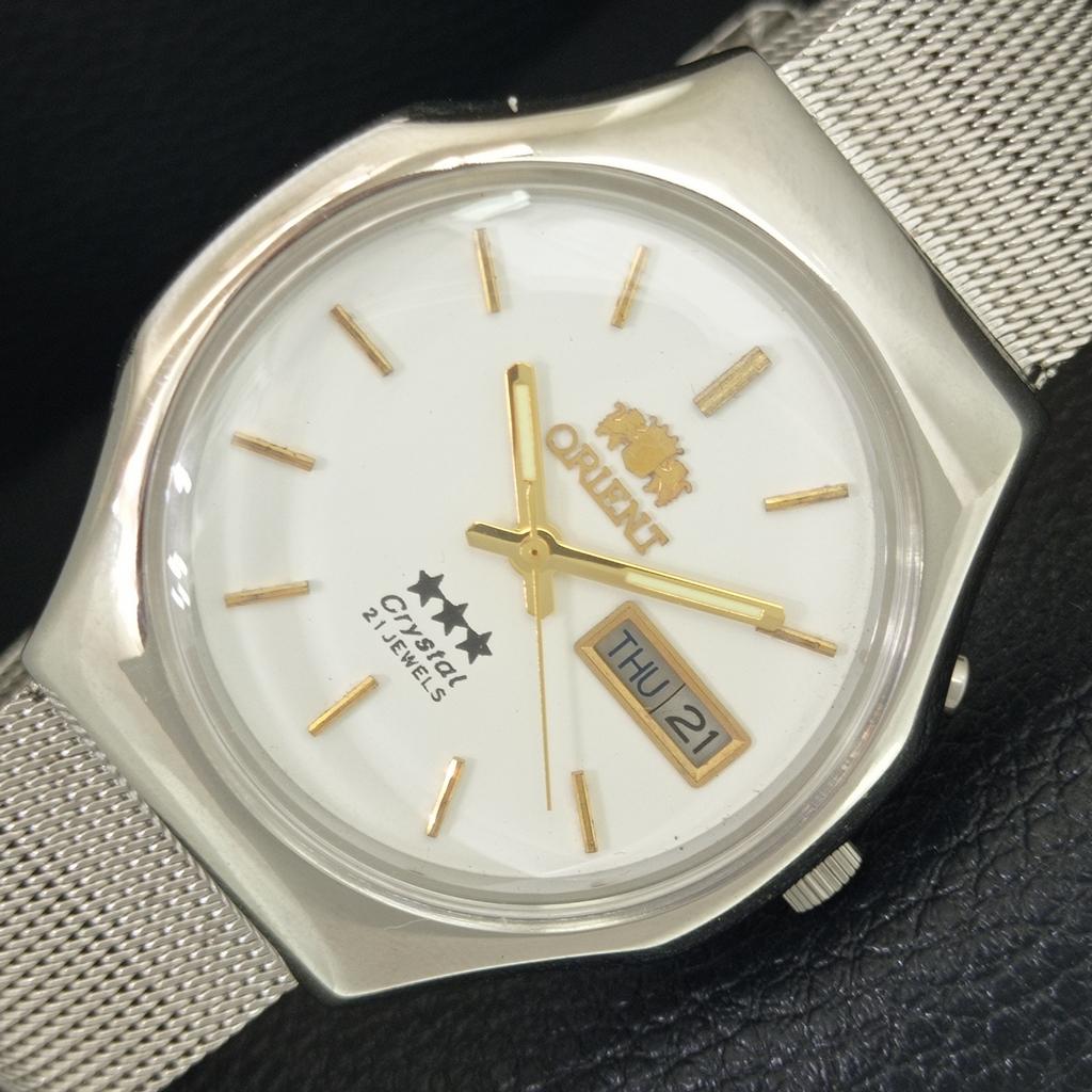 

ORIENT CRYSTAL AUTOMATIC 46941 VINTAGE JAPAN MENS WHITE DIAL WATCH a704879-1