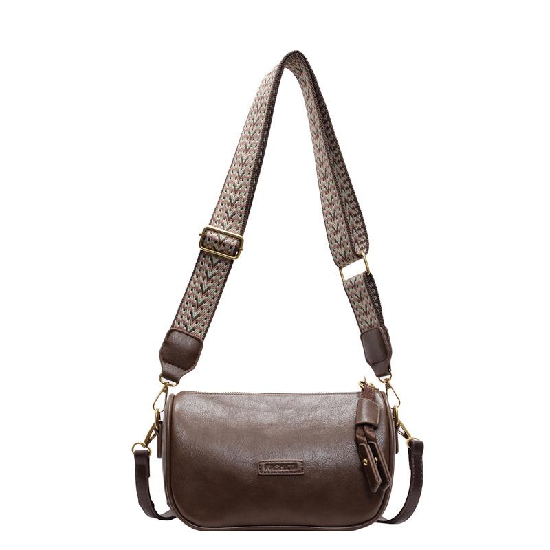 

This year, the popular Korean retro niche Boston bag wide shoulder strap commuting versatile solid color messenger pillow women s bag коричневый